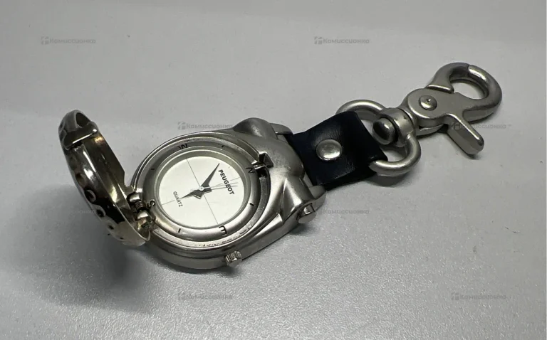 Часы  Peugeot