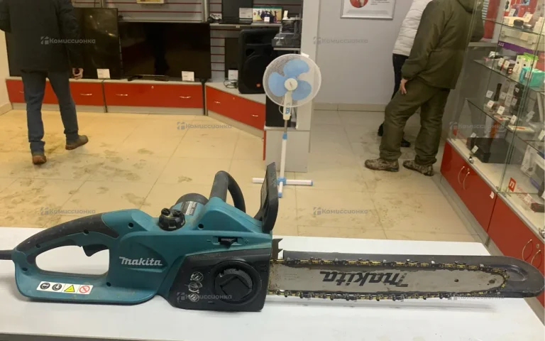 Электропила Makita UC4041A