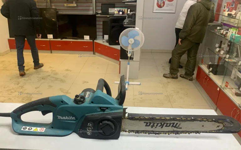 Электропила Makita UC4041A
